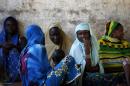 Internally displaced women from Bangui attend a   community meeting in Bambari