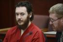 James Holmes and his defense attorney Daniel King (R)   sit in court for an advisement hearing at the Arapahoe County Justice Center in   Centennial, Colorado June 4, 2013. REUTERS/Andy Cross/Pool/Files