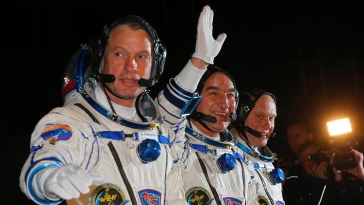 Crew members of a mission to the International Space Station (ISS), (from L) US astronaut Steven Swanson, Russian cosmonauts Alexander Skvortsov and Oleg Artemyev, pictured in Baikonur, Kazakhstan, on March 26, 2014