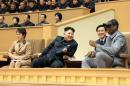 North Korean leader Kim Jong Un watches a basketball game between former U.S. NBA basketball players and North Korean players of the Hwaebul team of the DPRK with Dennis Rodman at Pyongyang Indoor Stadium