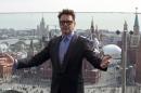 Cast member Robert Downey Jr. poses for a picture during a promotional photo event of the movie ''Iron Man 3