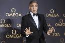 Director and actor George Clooney arrives at Omega's dinner party in Shanghai