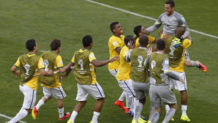 World Cup - Brazil survive Chile shootout to make quarter-finals