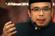 Corruption a bigger sin than consuming pork, former Perlis mufti tells Muslims