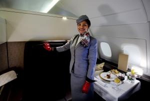 An Etihad Airways official poses for a photograph inside&nbsp;&hellip;