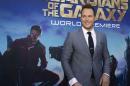 Chris Pratt poses at the premiere of "Guardians of the Galaxy" in Hollywood