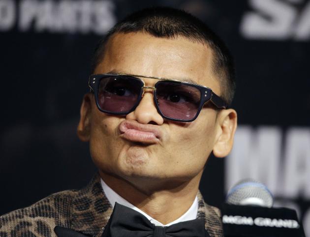 Marcos Maidana makes a face during a news conference Wednesday, Sept. 10, 2014, in Las Vegas. Maidana is scheduled to fight Floyd Mayweather Jr. in a welterweight title fight Saturday in Las Vegas