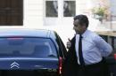 Former French President Nicolas Sarkozy arrives at   the National Assembly in Paris