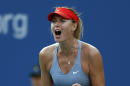 Maria Sharapova, of Russia, reacts after a point against Alexandra Dulgheru, of Romania, during the second round of the 2014 U.S. Open tennis tournament, Wednesday, Aug. 27, 2014, in New York. (AP Photo/Matt Rourke)