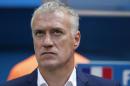 France's coach Deschamps looks on before the start of their 2014 World Cup round of 16 game against Nigeria at the Brasilia national stadium in Brasilia
