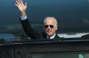 U.S. Vice President Joe Biden waves as he arrives at Borispol airport outside Kiev, Ukraine on Monday April 21, 2014. Vice President Joe Biden on Monday launched a high-profile visit to demonstrate the U.S. commitment to Ukraine and push for urgent implementation of an international agreement aimed at de-escalating tensions even as violence continues. Biden planned to meet Tuesday with government leaders who took over after pro-Russia Ukrainian President Viktor Yanukovych was ousted in February following months of protests. The White House said President Barack Obama and Biden agreed he should make the two-day visit to the capital city to send a high-level signal of support for reform efforts being pushed the new government. (AP Photo/Sergei Chuzavkov)