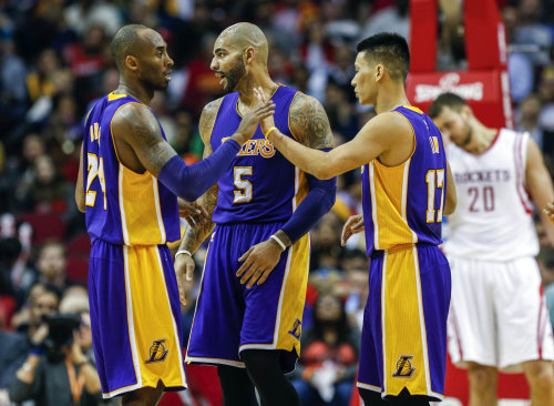 Los Angeles Lakers guard Kobe Bryant (24) and guard Jeremy Lin (17) (Troy Taormina-USA TODAY Sports)