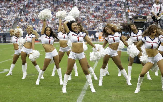 The Houston Texans cheerleaders perform during halftime of an NFL football game Sunday, Sept. 7, 2014, in Houston. (AP Photo/Patric Schneider)