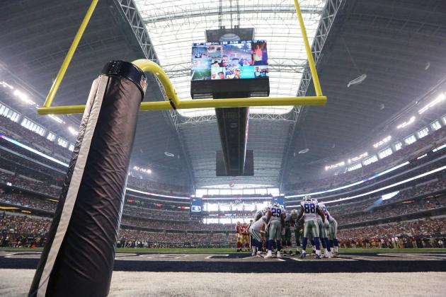 The Dallas Cowboys huddle in the first half of an NFL football game against the San Francisco 49ers, Sunday, Sept. 7, 2014, in Arlington, Texas. (AP Photo/LM Otero)