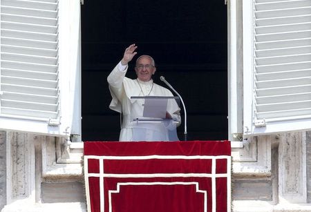 Pope Francis waves as he delivers his Sunday Angelus prayer from the window of the Apostolic Palace in Saint Peter&amp;#39;s Square at the Vatican July 27, 2014.  REUTERS/Alessandro Bianchi
