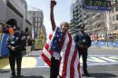 Meb Keflezighi, of San Diego, Calif., celebrates his victory in the 118th Boston Marathon Monday, April 21, 2014 in Boston.(AP Photo/Elise Amendola)