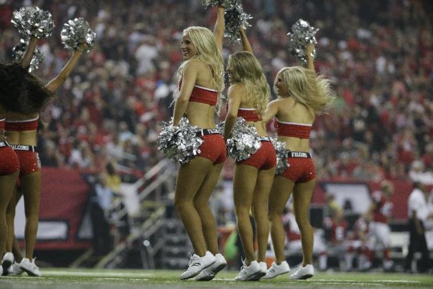 Atlanta Falcons cheerleaders perform during the second half of an NFL football game against the New Orleans Saints, Sunday, Sept. 7, 2014, in Atlanta. (AP Photo/David Goldman)