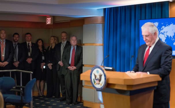 PHOTO: Staff members including Deputy Secretary of State John Sullivan, second from right, watches as Secretary of State Rex Tillerson speaks at a news conference at the State Department in Washington, March 13, 2018. (Andrew Harnik/AP)