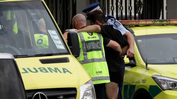 PHOTO: Police and ambulance staff help a wounded man from outside a mosque in central Christchurch, New Zealand, Friday, March 15, 2019. A witness says many people have been killed in a mass shooting at a mosque in the New Zealand city of Christchurch. (AP)
