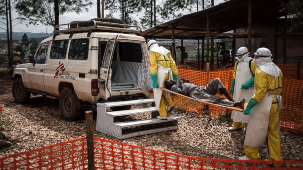 PHOTO: Health workers move a patient to a hospital after he was cleared of having Ebola inside of a Medecins Sans Frontieres supported Ebola treatment center in Butembo, Congo, Nov. 4, 2018. (John Wessels/MSF via AP)