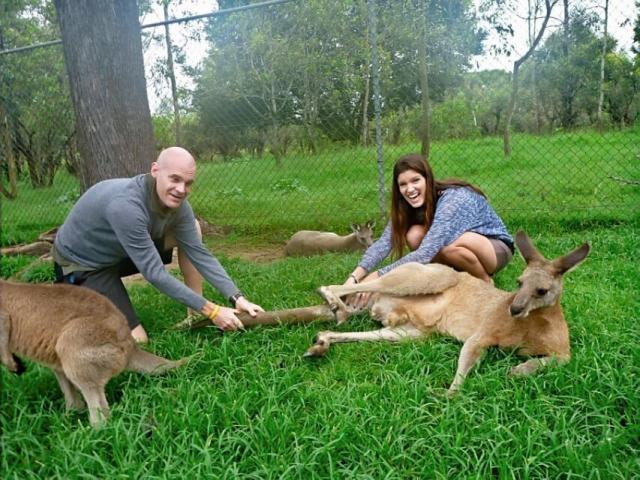 Varnish (right) and her brother Daniel reenacting their 1986 photo while revisiting Brisbane's Lone Pine Sanctuary, Australia, in February 2012. (Photo: Courtesy of Jo Varnish)