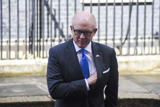 New York Jets owner and U.S. Ambassador to the U.K. Woody Johnson caused a stir on Wednesday when he was using his cell phone during D-Day ceremonies. (Getty Images)