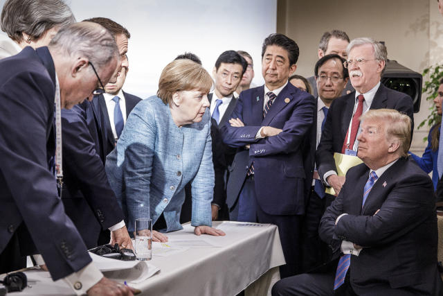 File Photo: In this photo provided by the German Government Press Office (BPA), German Chancellor Angela Merkel deliberates with US president Donald Trump on the sidelines of the official agenda on the second day of the G7 summit on June 9, 2018 in Charlevoix, Canada. (Photo by Jesco Denzel /Bundesregierung via Getty Images)