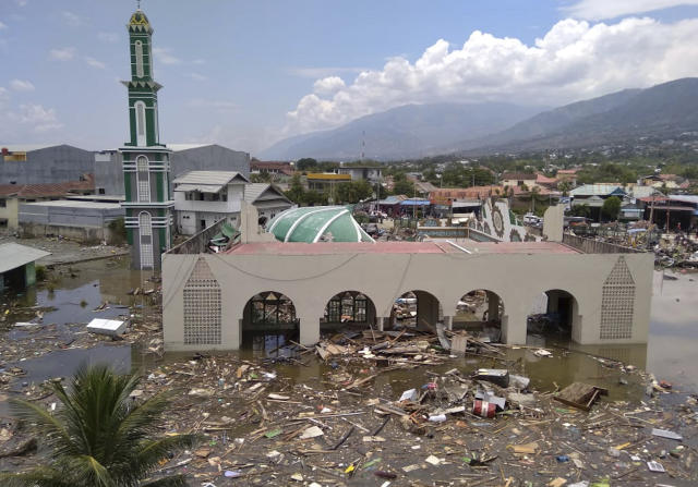 The ruin of a mosque badly damaged by earthquake and tsunami is seen in Palu, Central Sulawesi, Indonesia, Saturday, Sept. 29, 2018. The powerful earthquake rocked the Indonesian island of Sulawesi on Friday, triggering a 3-meter-tall (10-foot-tall) tsunami that an official said swept away houses in at least two cities. (AP Photo/Rifki)