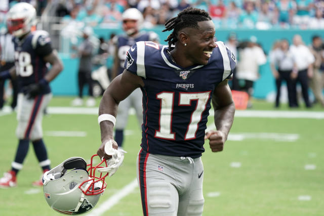 Sep 15, 2019; Miami Gardens, FL, USA; New England Patriots wide receiver Antonio Brown (17) celebrates in the fourth quarter against the Miami Dolphins at Hard Rock Stadium. The Patriots defeated the Dolphins 43-0. Mandatory Credit: Kirby Lee-USA TODAY Sports