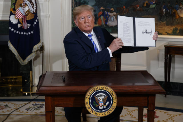 President Trump signs a presidential memorandum on the Iran nuclear deal in the Diplomatic Reception Room of the White House, May 8, 2018. (Photo: AP/Evan Vucci)