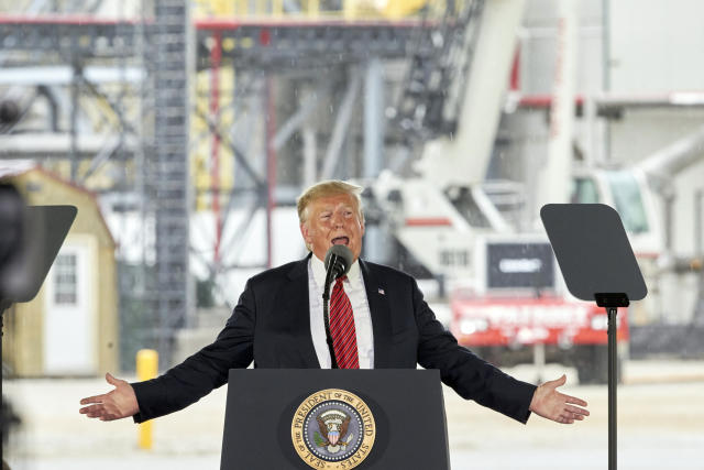 FILE - In this June 11, 2019, file photo, President Donald Trump speaks at Southwest Iowa Renewable Energy, an ethanol producer in Council Bluffs, Iowa. Trump has repeatedly told U.S. farmers he loves and supports them and in return they largely continue to support him even though some of his promises, better trade deals and strong support for corn-based ethanol, haven't been fully kept. For many farmers and the politicians representing them criticizing the policy failures but not the president himself is a delicate dance. (AP Photo/Nati Harnik, File)