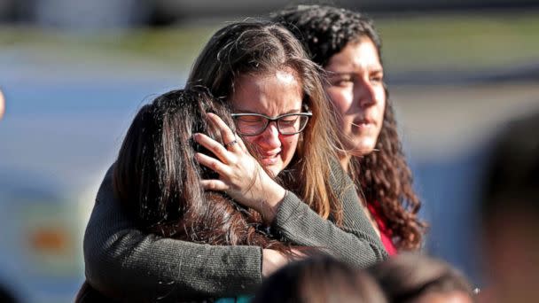 PHOTO: Students released from a lockdown embrace following a shooting at Marjory Stoneman Douglas High School in Parkland, Fla., Feb. 14, 2018. (John McCall/South Florida Sun-Sentinel/AP)