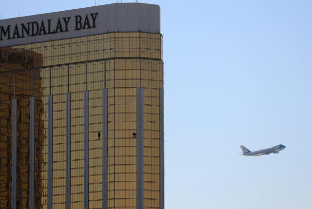 Broken windows are seen from outside the Mandalay Bay Hotel in Las Vegas, where Stephen Paddock carried out the mass shooting in October. (Mike Blake / Reuters)