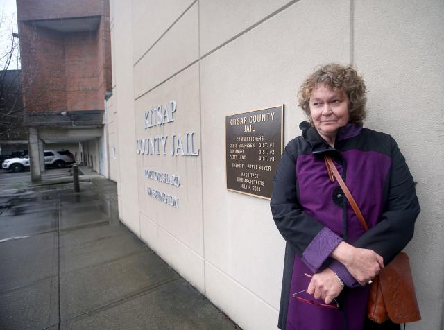 Carol Carlson stands outside Kitsap County Jail on Dec. 28, 2018, in Port Orchard, Washington. She had been accused of drunken driving about a year ago and placed in jail for a day but later was diagnosed with a stroke.
